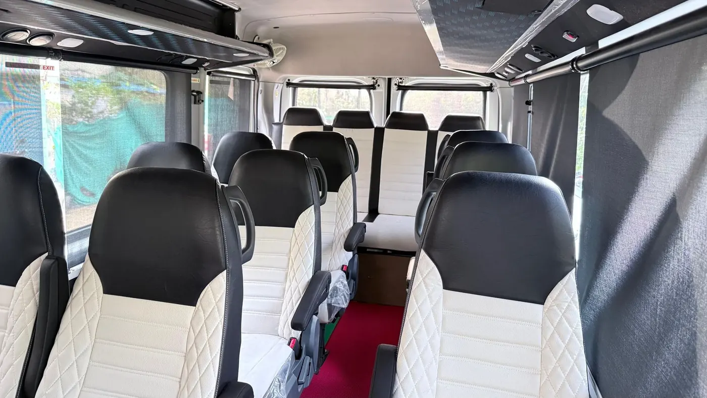 Force Urbania neat rows of AC seats interior - Force Urbania Indore rental